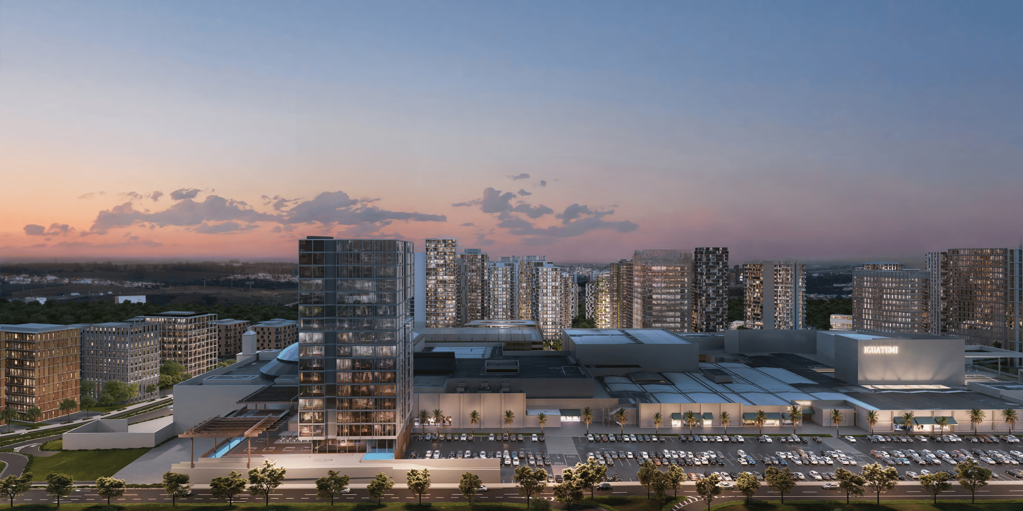 Vista aérea do Avenida 105 Casa Figueira ao pôr do sol